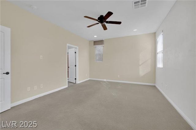 spare room featuring carpet, baseboards, visible vents, recessed lighting, and ceiling fan