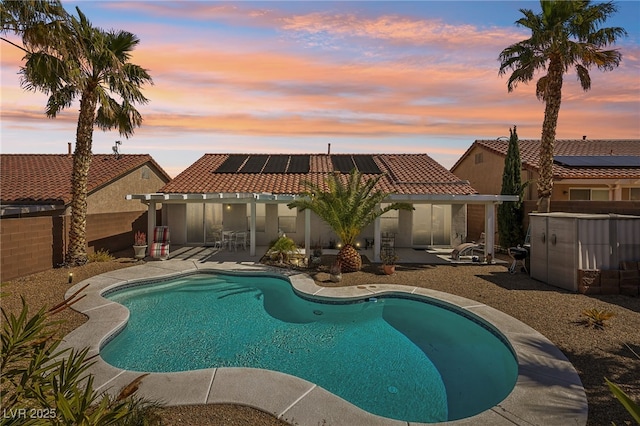 view of pool featuring a patio area, a fenced in pool, and a fenced backyard