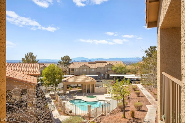 view of pool with a patio, a fenced in pool, a gazebo, fence private yard, and a mountain view