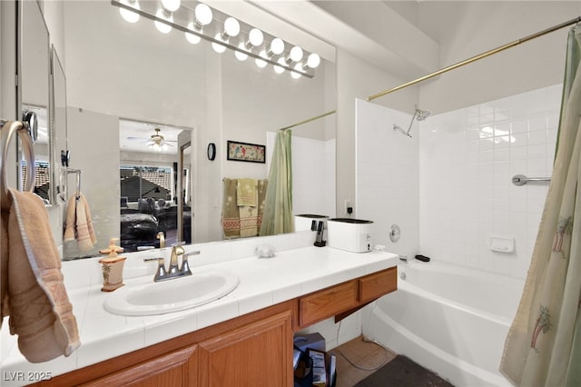 bathroom featuring vanity, ceiling fan, and shower / bath combo