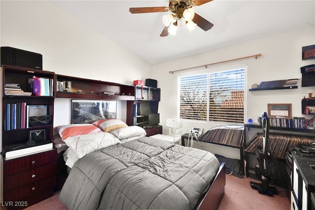 carpeted bedroom with lofted ceiling and a ceiling fan