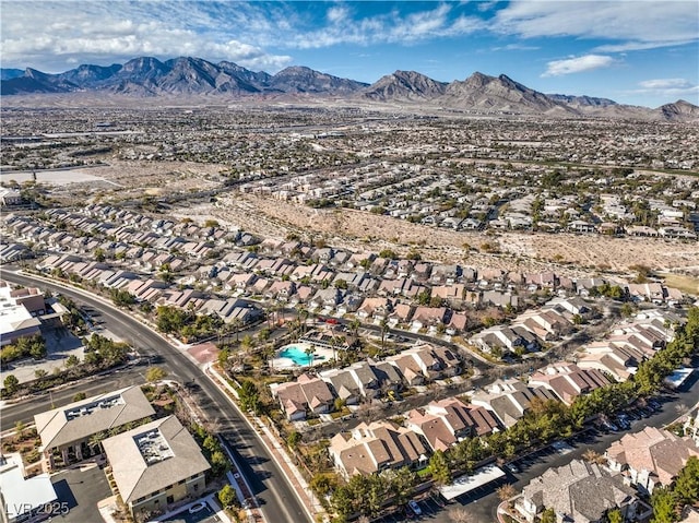 drone / aerial view featuring a mountain view and a residential view