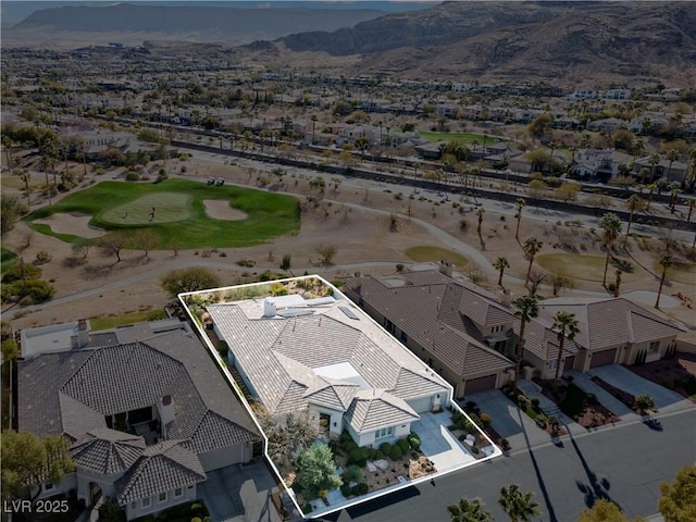 drone / aerial view with a mountain view and a residential view