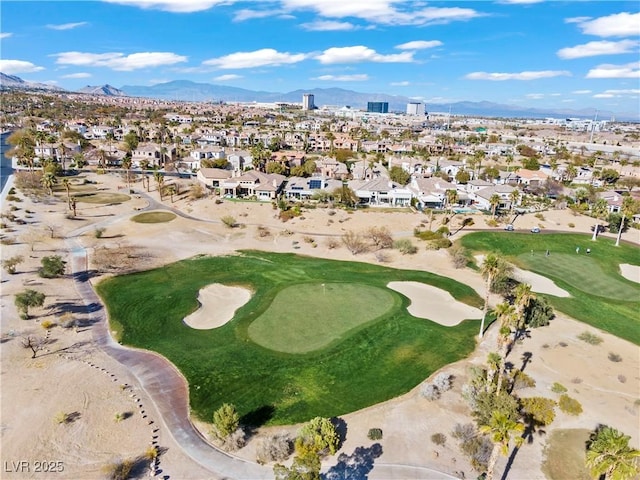 aerial view featuring a residential view, a mountain view, and view of golf course