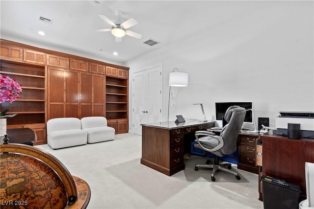 home office with recessed lighting, a ceiling fan, visible vents, and light carpet