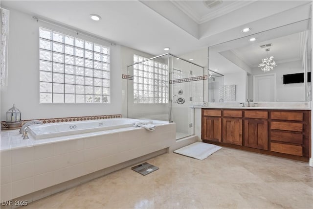 bathroom featuring visible vents, a shower stall, crown molding, a bath, and vanity