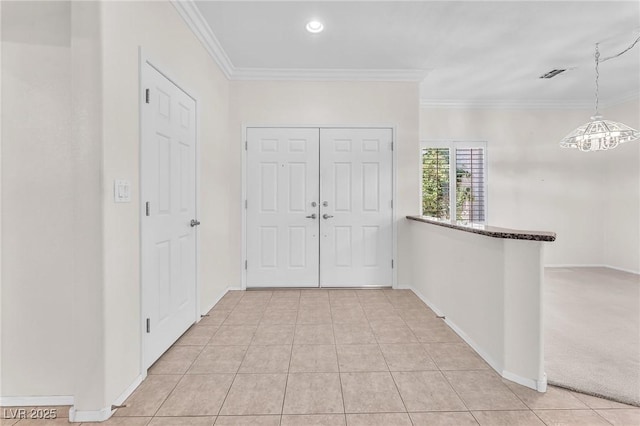 1596 Fieldbrook St, Henderson, NV 89052 - entrance foyer with crown molding, baseboards, and light tile patterned floors