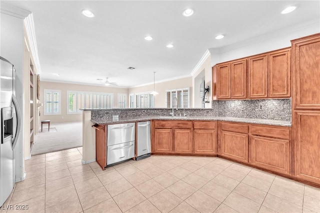 1596 Fieldbrook St, Henderson, NV 89052 - kitchen with brown cabinets, ornamental molding, stainless steel appliances, a sink, and light tile patterned floors