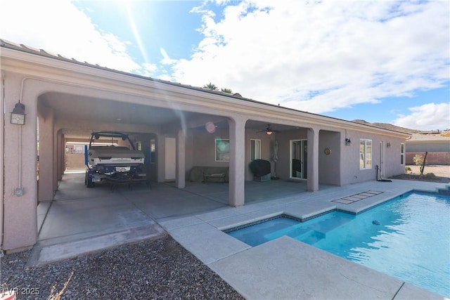 pool featuring a patio area and ceiling fan