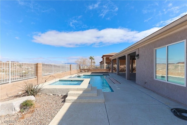 view of pool featuring a fenced backyard, a fenced in pool, an in ground hot tub, and a patio