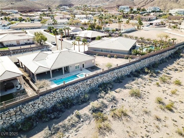 bird's eye view featuring a residential view and a mountain view