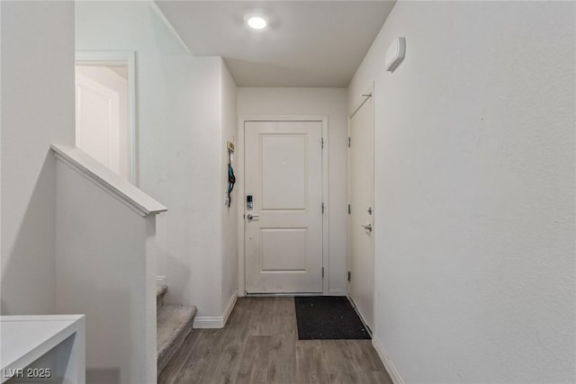 2901 Bahama Yellow Ave, North Las Vegas, NV 89086 - doorway with stairway, baseboards, and wood finished floors