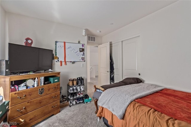 2901 Bahama Yellow Ave, North Las Vegas, NV 89086 - bedroom featuring visible vents, carpet flooring, and a closet