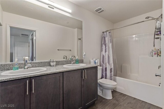 2901 Bahama Yellow Ave, North Las Vegas, NV 89086 - bathroom with a sink, visible vents, toilet, and wood finished floors