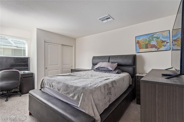 2901 Bahama Yellow Ave, North Las Vegas, NV 89086 - bedroom with a closet, visible vents, and light colored carpet