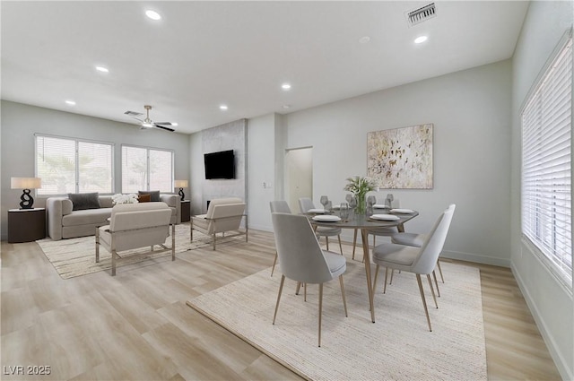 dining room featuring recessed lighting, visible vents, light wood finished floors, and baseboards