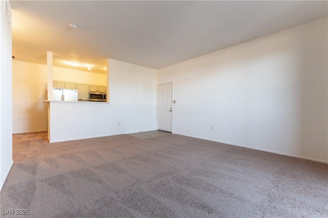 unfurnished living room with carpet floors