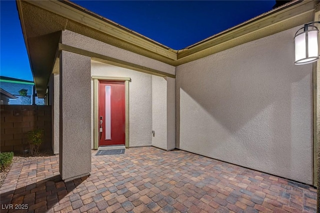 view of patio featuring fence