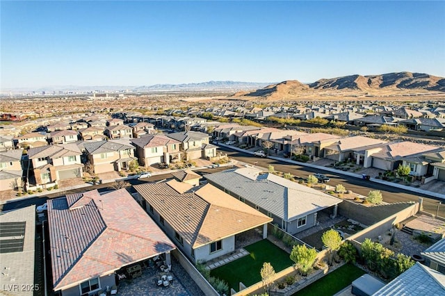 bird's eye view with a mountain view and a residential view