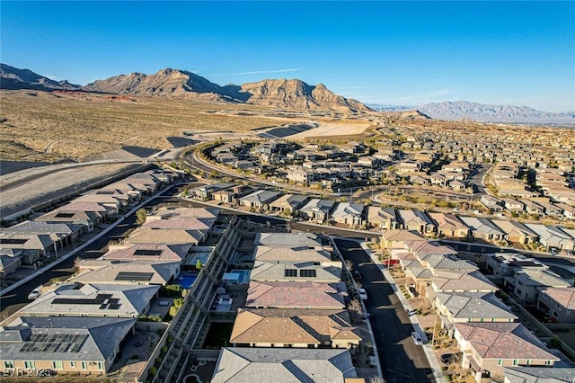 aerial view with a mountain view and a residential view