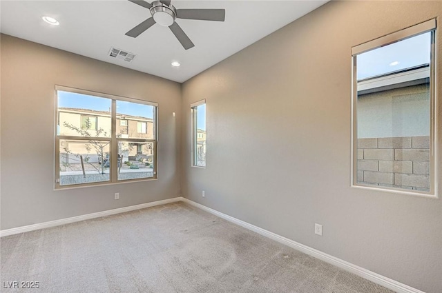 empty room featuring recessed lighting, visible vents, carpet floors, and baseboards