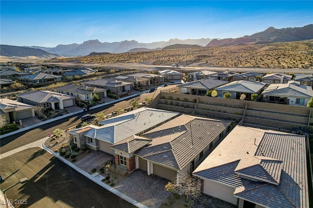 aerial view with a mountain view and a residential view