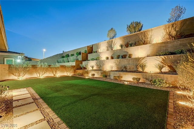 view of yard featuring a fenced backyard