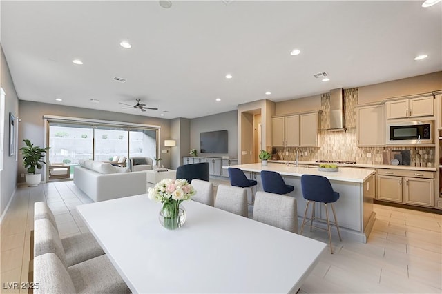 dining room featuring light tile patterned floors, recessed lighting, and visible vents