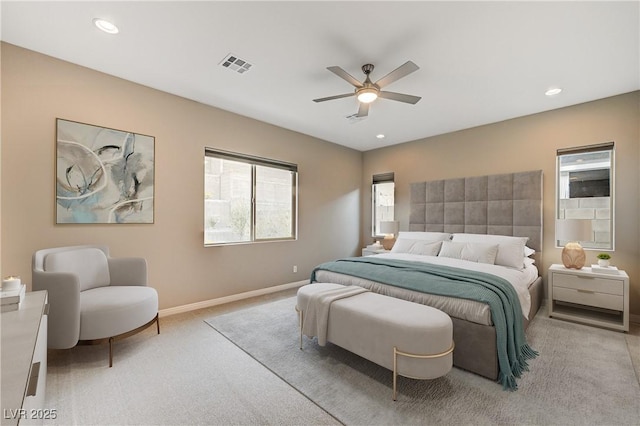 bedroom with light carpet, visible vents, recessed lighting, and baseboards