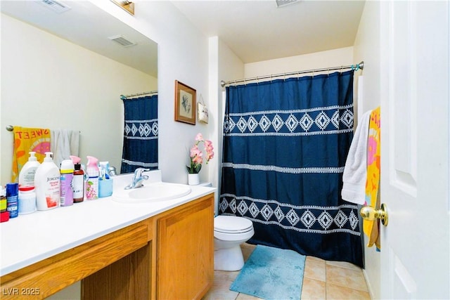 full bath featuring visible vents, toilet, vanity, and tile patterned flooring