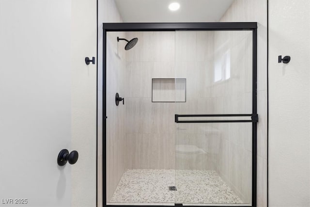 full bathroom with a stall shower