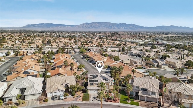 aerial view with a mountain view and a residential view