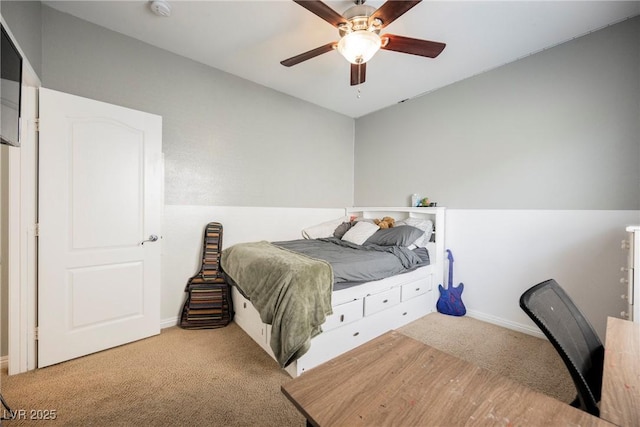 bedroom with baseboards, ceiling fan, and carpet flooring