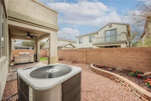 view of yard featuring a ceiling fan, a patio area, cooling unit, and a fenced backyard