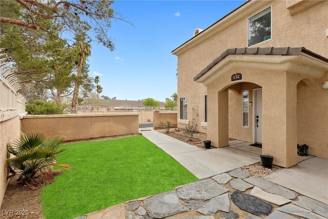 view of yard with fence