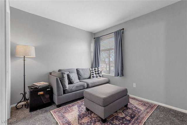 living room featuring carpet flooring and baseboards