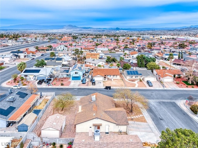 bird's eye view featuring a residential view and a mountain view