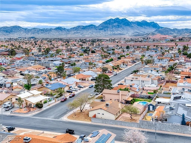 aerial view with a mountain view and a residential view