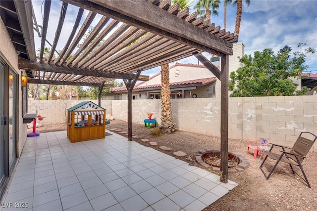 view of patio / terrace with a fenced backyard and a pergola