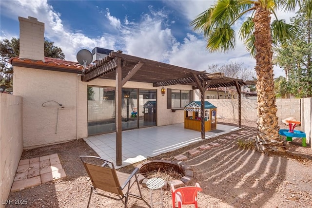 view of patio featuring a fenced backyard and a pergola