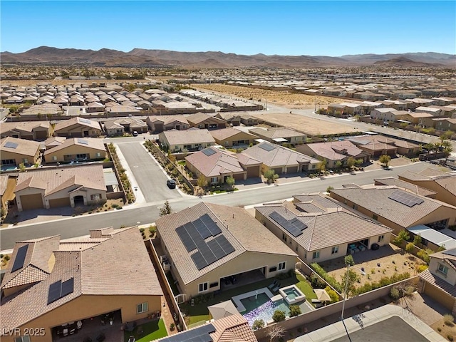 bird's eye view featuring a mountain view and a residential view