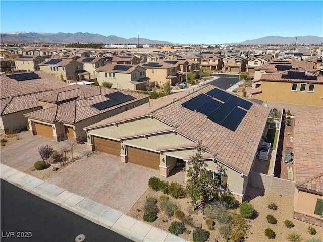 aerial view with a mountain view and a residential view