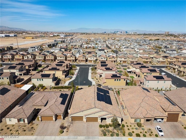 birds eye view of property with a residential view