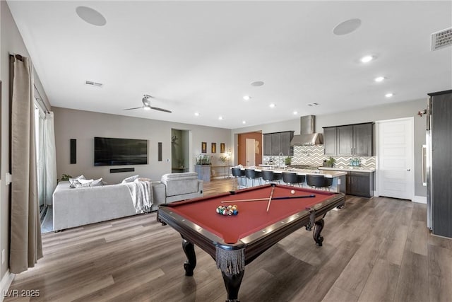 game room with visible vents, recessed lighting, and wood finished floors