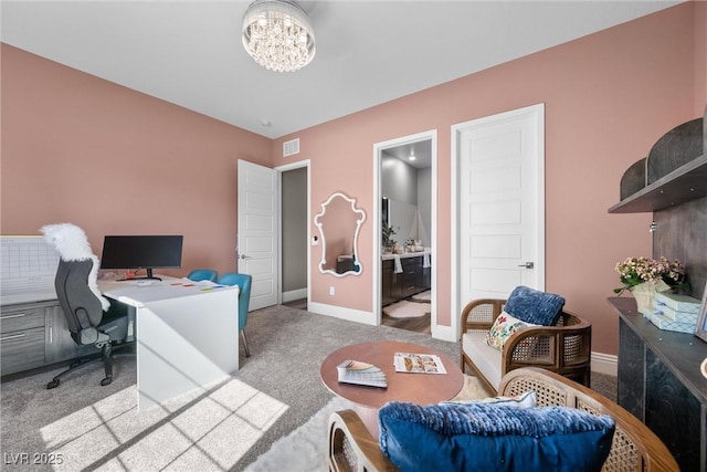 home office featuring a chandelier, visible vents, baseboards, and carpet