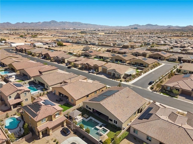 aerial view with a mountain view and a residential view