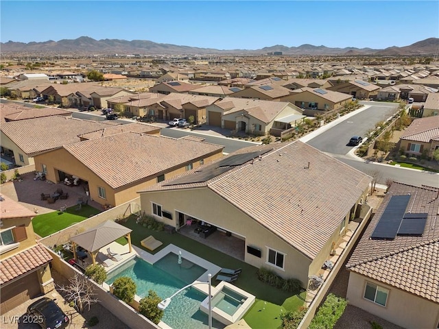 bird's eye view with a mountain view and a residential view