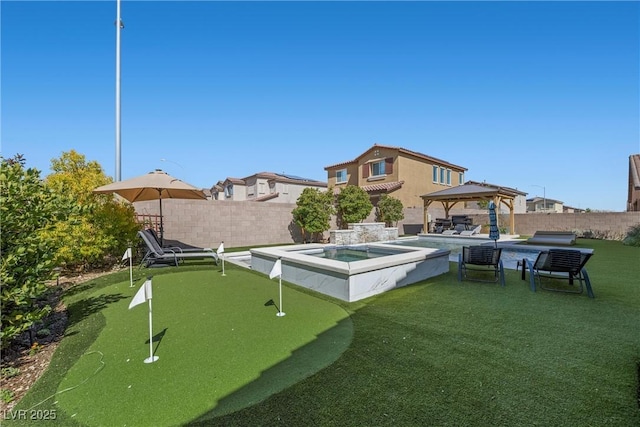 exterior space with a gazebo, a fenced in pool, and a fenced backyard