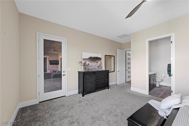 interior space with carpet, visible vents, baseboards, ceiling fan, and connected bathroom