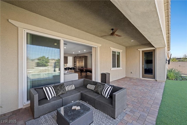 view of patio / terrace with an outdoor hangout area and ceiling fan